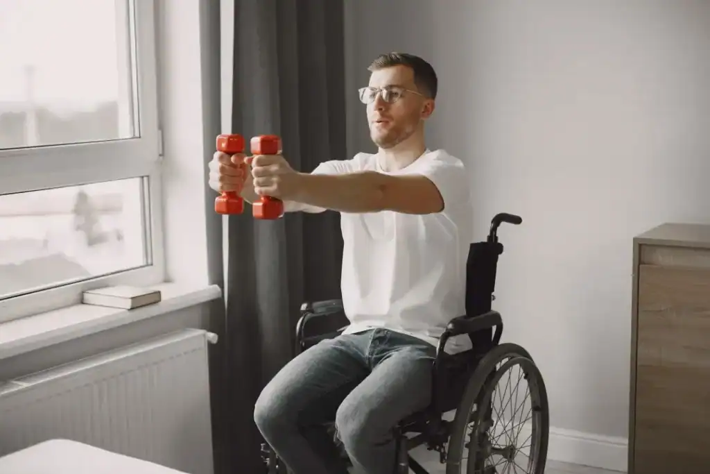 Empowering Weight Loss: A Comprehensive Guide for Individuals with Disabilities 1 Image of man doing exercise in his wheelchair to aid weight loss Windlesham