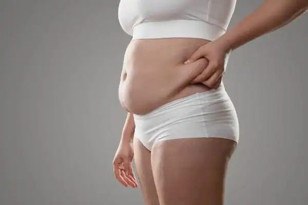 The Hidden Connection: How Stress Shapes Your Fitness and Body Composition 1 Image of stress belly Windlesham How Lipo 360 can help manage your symptoms