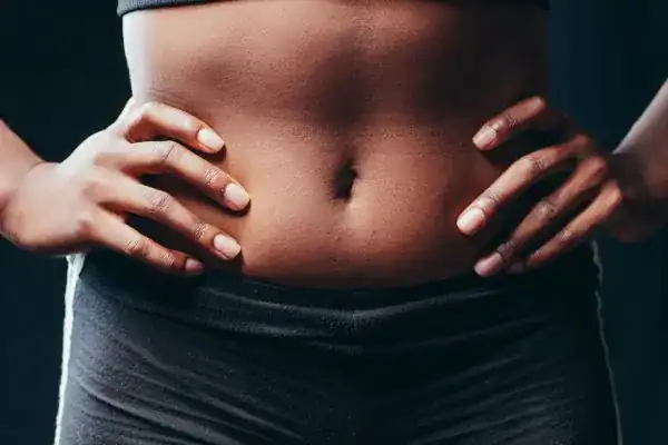 Toning Your Stomach: The Ultimate Guide to Achieving a Sculpted Stomach While Shedding Pounds 1 Image of a toned stomach after non surgical treatment Windlesham